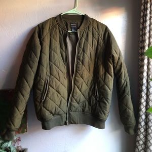 Green quilted puffer jacket